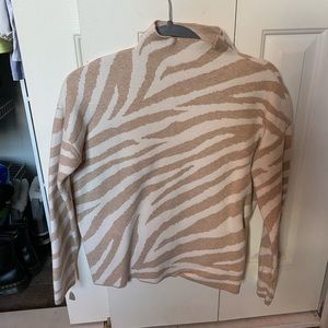 Zebra print turtleneck sweater